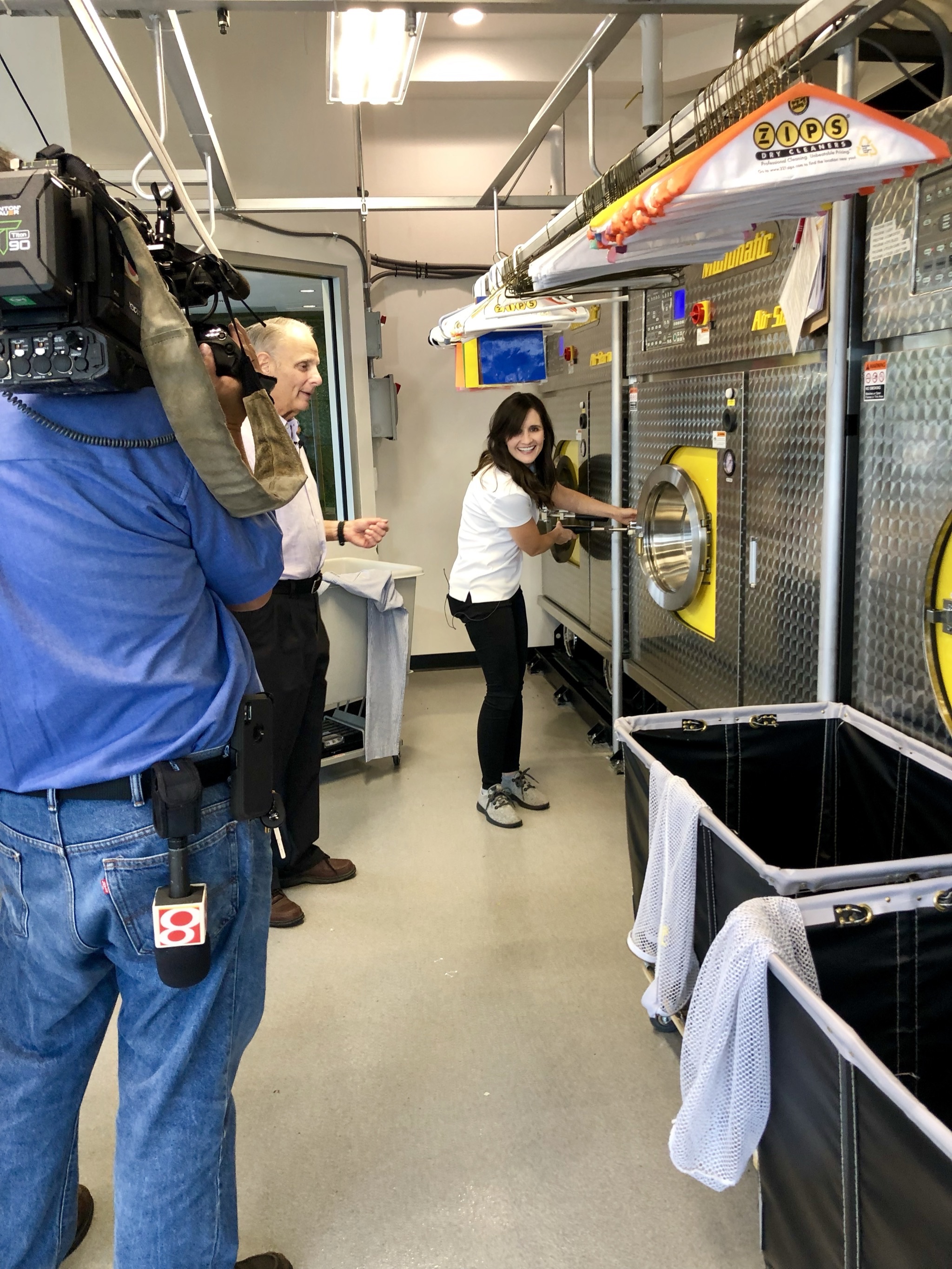 Emma Frutkin at the dry cleaning store where Sea Salt & Seltzer's story began